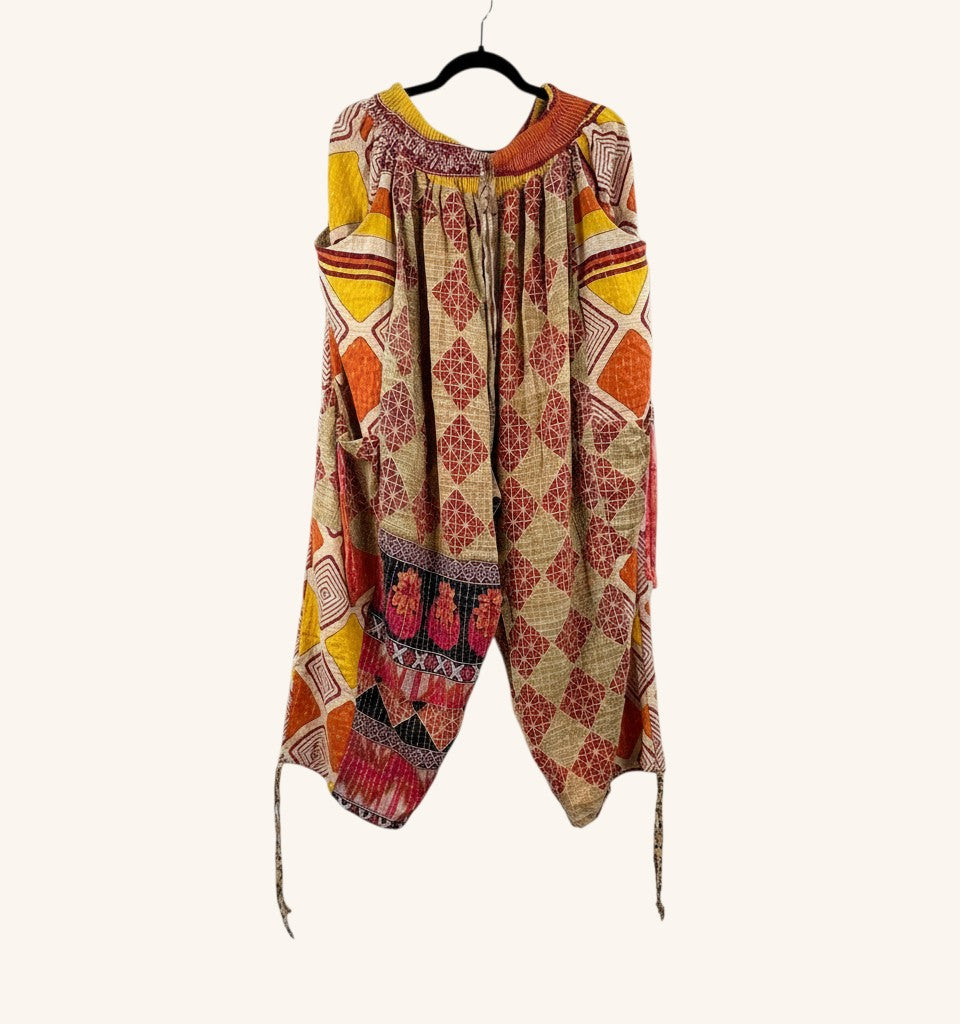 She Lives Beauty Roam Free Kantha cargo joggers in vintage cotton with geometric patterns and warm orange tones.