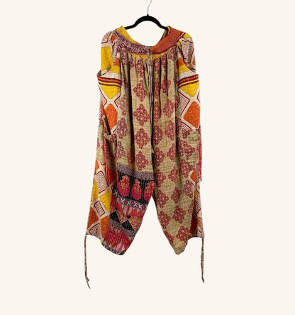 She Lives Beauty Roam Free Kantha cargo joggers in vintage cotton with geometric patterns and warm orange tones.