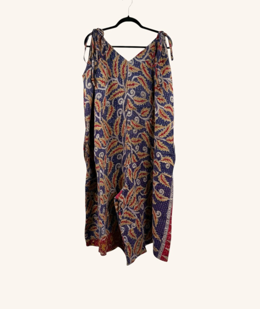 She Lives Beauty Sacred Journey Kantha jumpsuit in vintage cotton with blue and red floral patterns and adjustable straps.