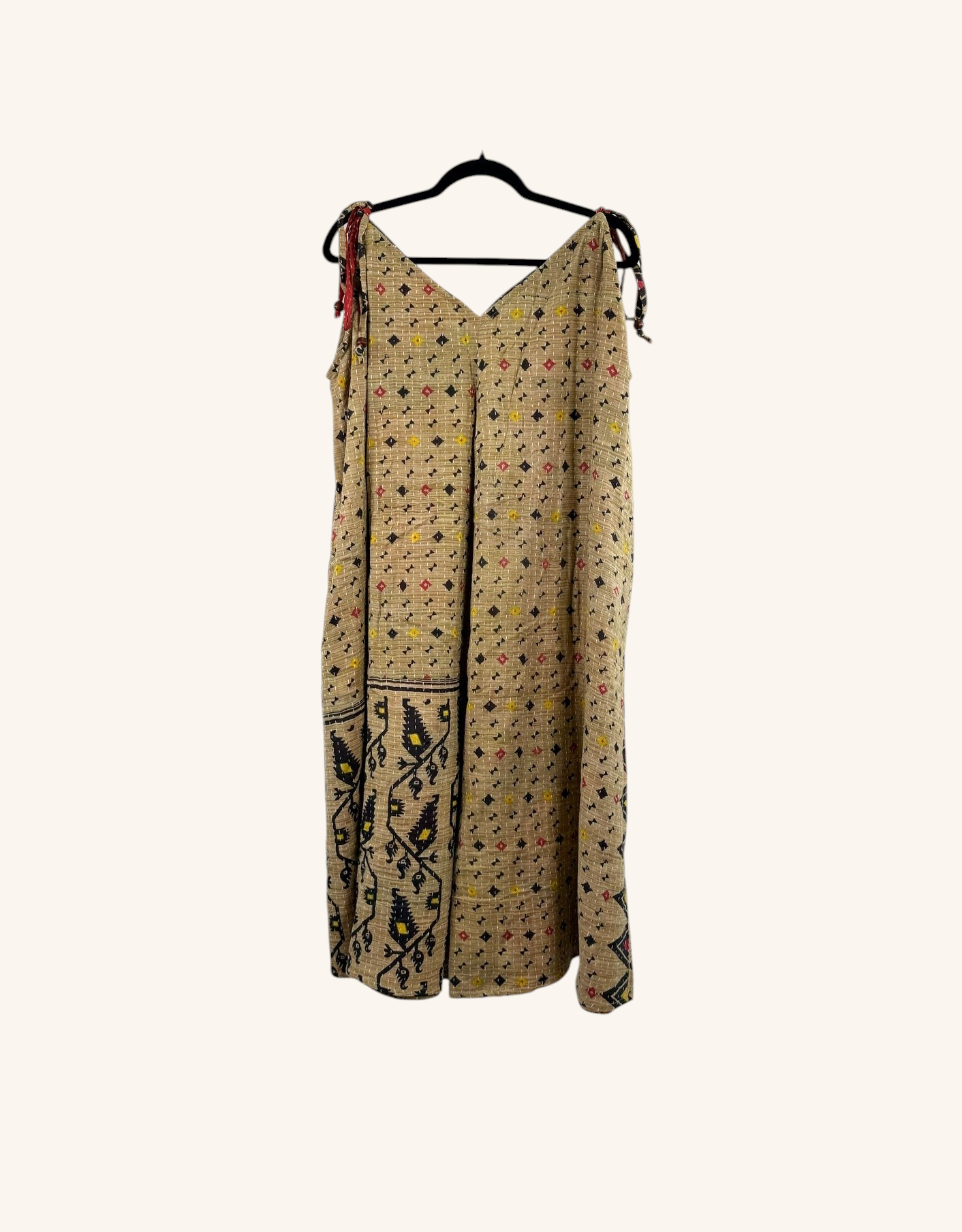 She Lives Beauty Sacred Journey Kantha jumpsuit in beige vintage cotton with colorful geometric embroidery and ties.