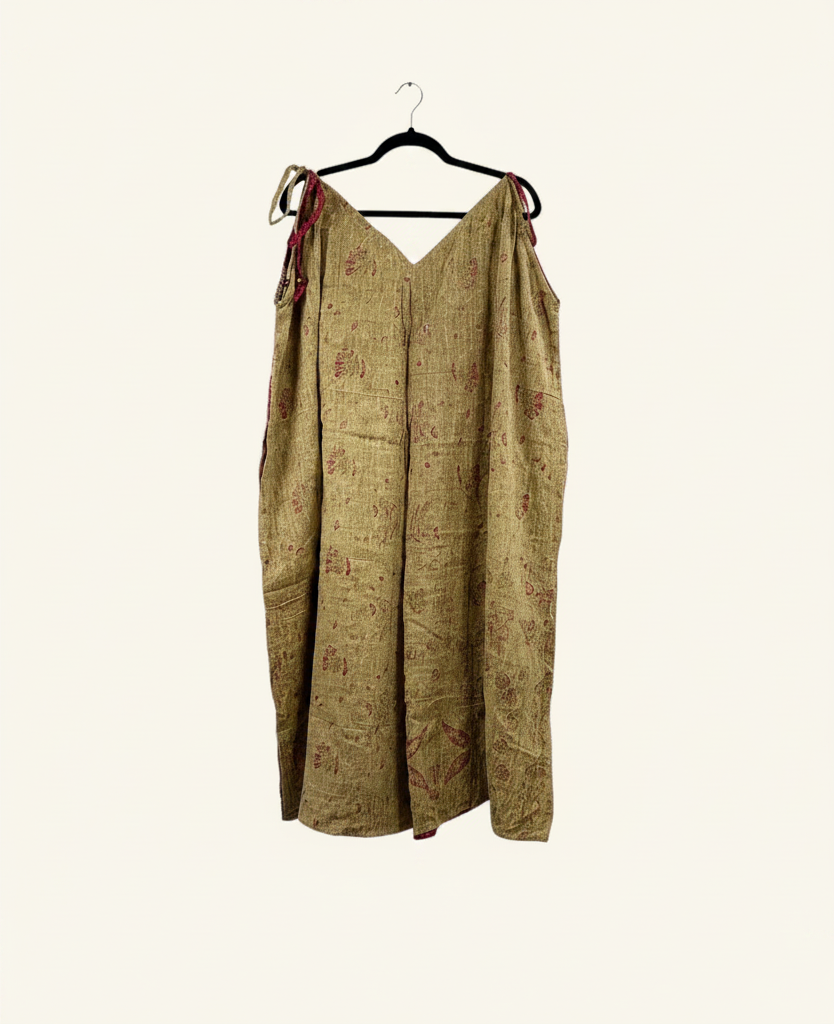 She Lives Beauty Sacred Journey Kantha jumpsuit in tan vintage cotton with red stitching and adjustable straps.