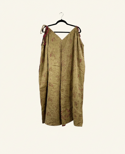 She Lives Beauty Sacred Journey Kantha jumpsuit in tan vintage cotton with red stitching and adjustable straps.