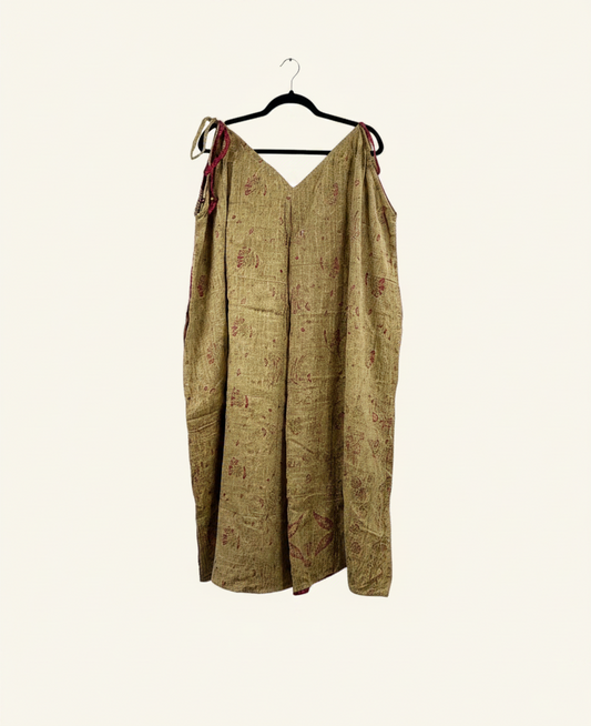 She Lives Beauty Sacred Journey Kantha jumpsuit in tan vintage cotton with red stitching and adjustable straps.