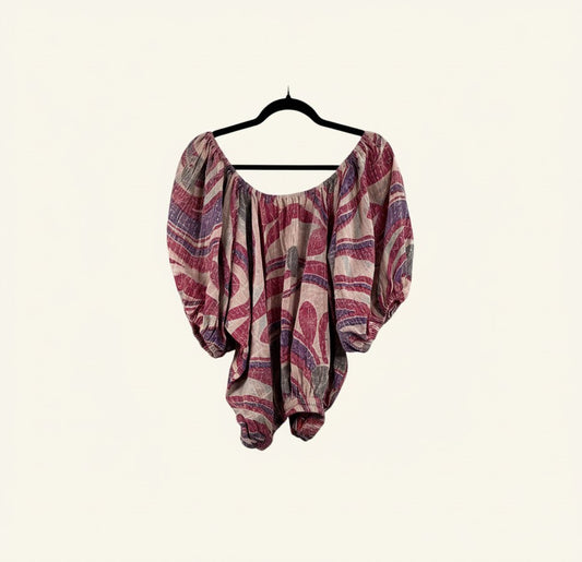 She Lives Beauty Wildflower Bloom Kantha top in vintage cotton with purple and red floral patterns and bubble sleeves.