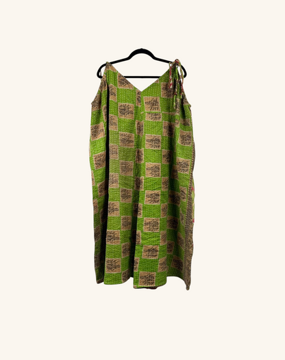 She Lives Beauty Sacred Journey Kantha jumpsuit in green and tan vintage cotton with a checkered pattern and straps.