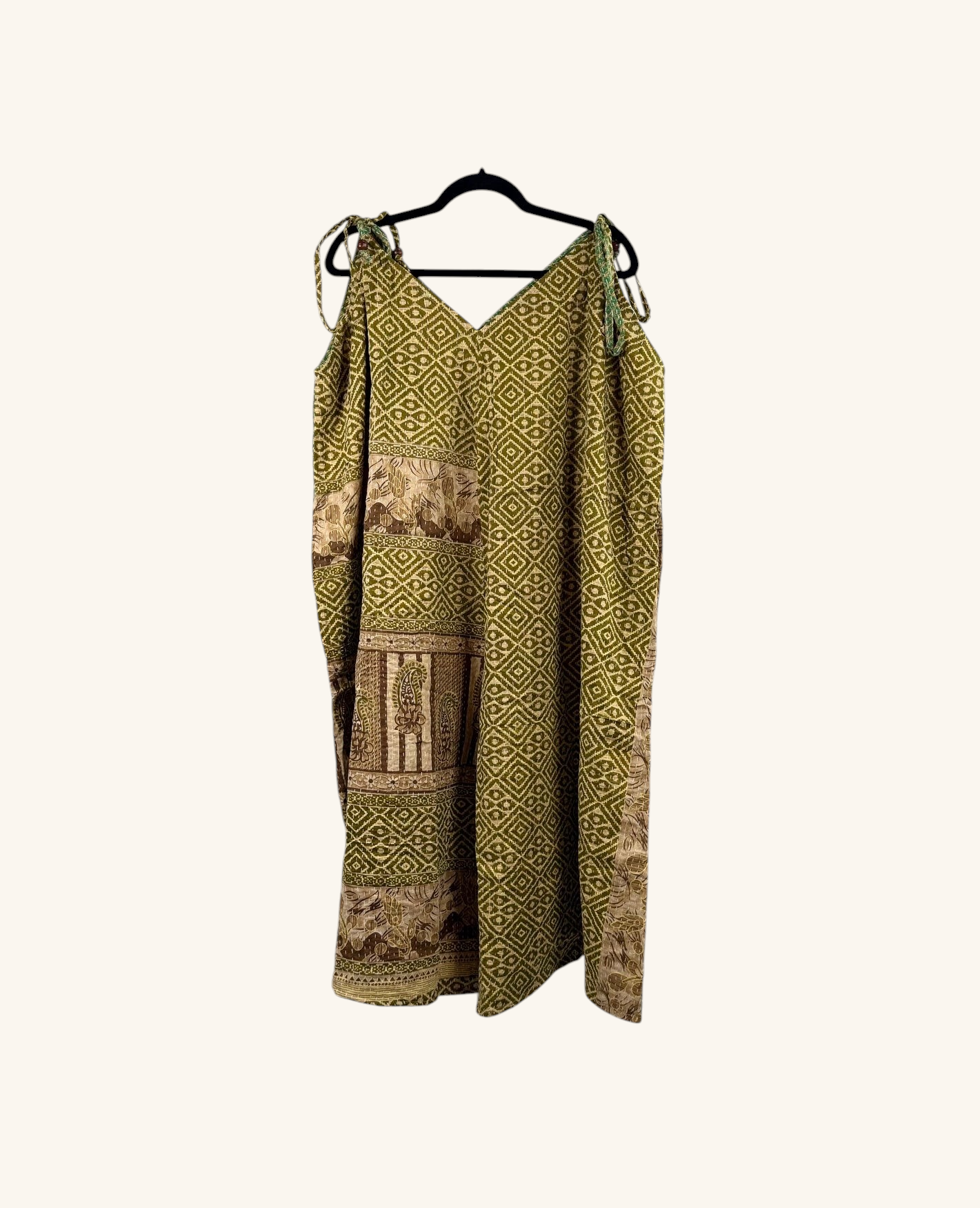 She Lives Beauty Sacred Journey Kantha jumpsuit in olive green vintage cotton with geometric patterns and tie straps.