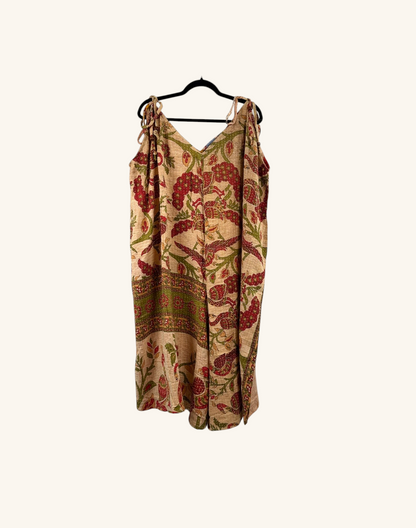 She Lives Beauty Sacred Journey Kantha Jumpsuit in vintage cotton with red and green floral print and tie straps.