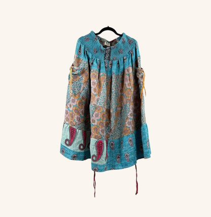 She Lives Beauty Earthbound midi skirt in vintage kantha cotton with adjustable leg cinches and bohemian floral print.