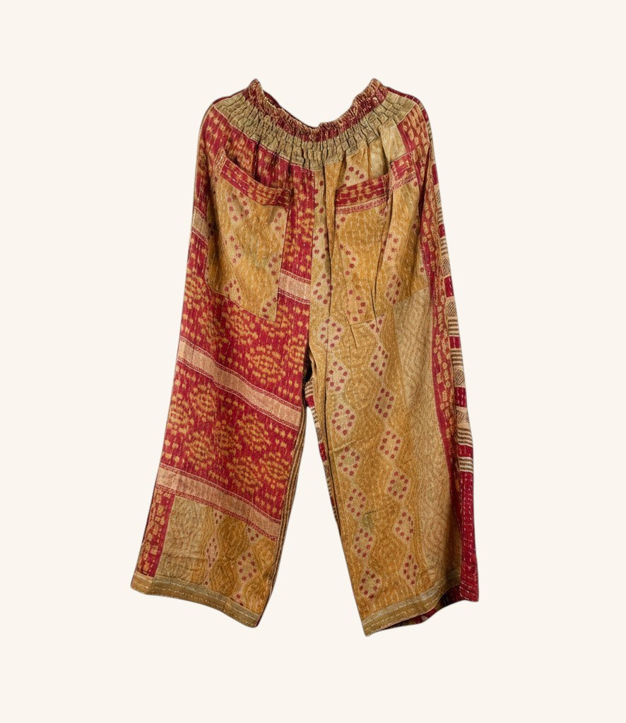 She Lives Beauty wide leg pants in vintage patchwork cotton with red and gold kantha stitching and elastic waistband.