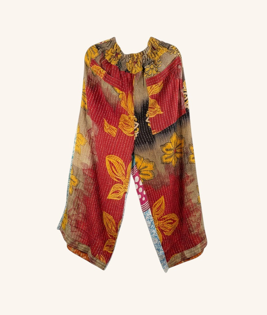 She Lives Beauty wide leg pants made from vintage kantha stitched cotton saris with a colorful floral patchwork print.