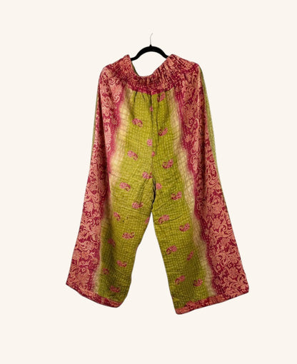 She Lives Beauty wide-leg Kantha pants in green and pink vintage cotton with bohemian patchwork and hand-stitched detail.