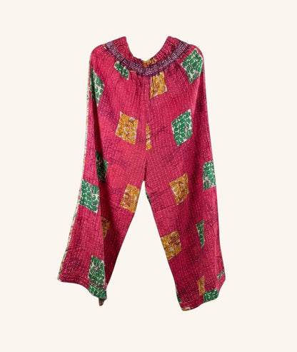 She Lives Beauty wide leg pants in pink vintage kantha cotton with green and yellow patchwork patterns.