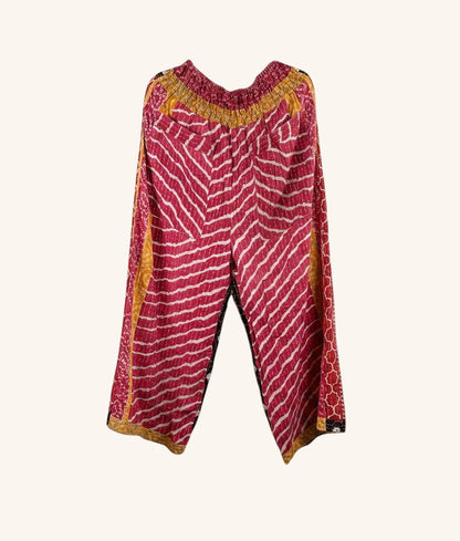 She Lives Beauty wide leg pants in pink and yellow vintage kantha cotton with hand-stitched striped patterns.