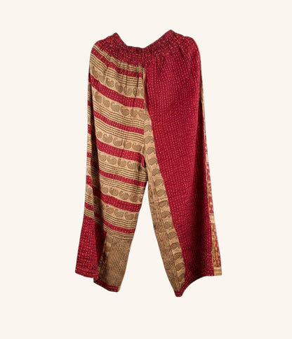 She Lives Beauty wide-leg Kantha pants in red and beige vintage cotton with hand-stitched patchwork patterns.