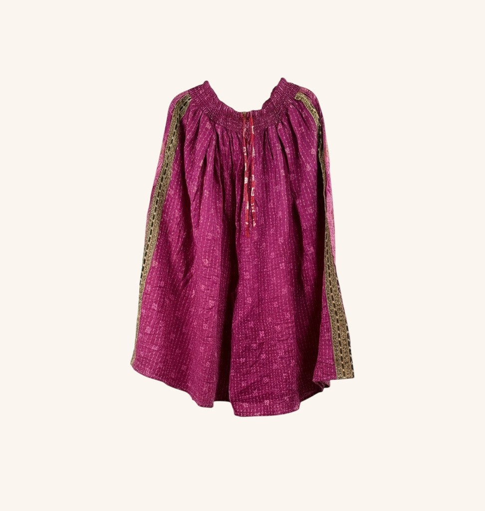 She Lives Beauty Pachuco Kantha capri pants in magenta vintage cotton with intricate stitching and side panel details.