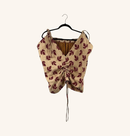 She Lives Beauty Monarch Kantha tank top in beige cotton with red leaf print, adjustable cinched front and straps.