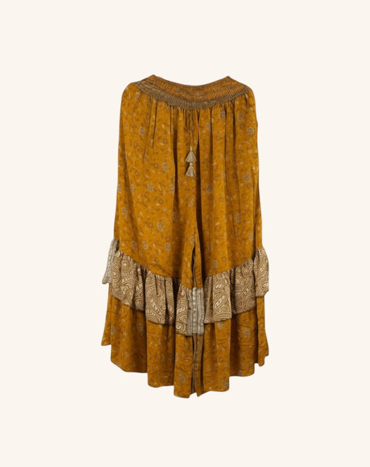 She Lives Beauty Gypsy Moon silk pants in mustard yellow with vintage rasgulla patterns and double ruffled hem detail.
