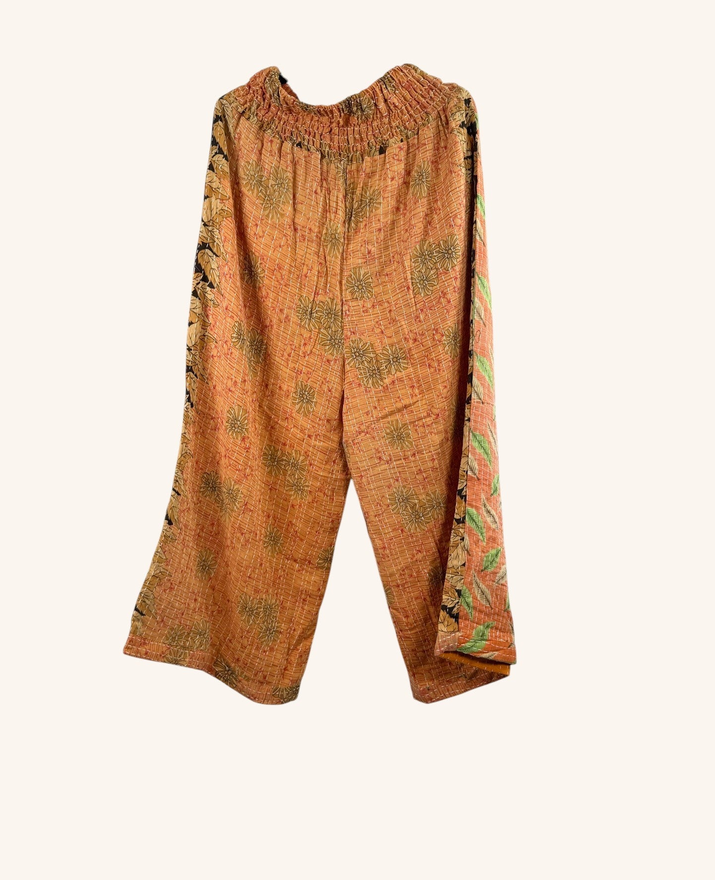 She Lives Beauty Everyday Amaya wide-leg pants in orange vintage kantha cotton with floral patchwork and elastic waist.