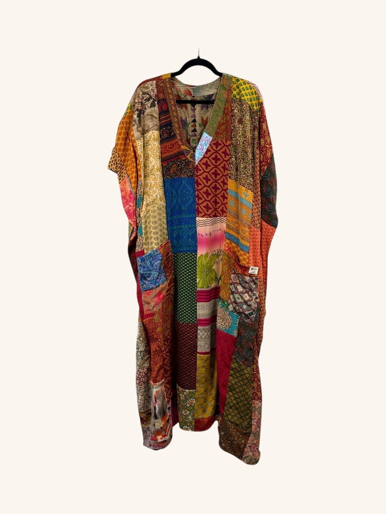 She Lives Beauty Luna Rosa reversible kaftan made from colorful vintage patchwork Rasgulla silk in a relaxed silhouette.
