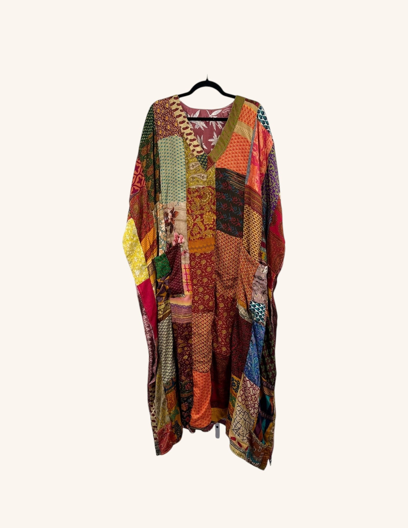 She Lives Beauty Luna Rosa reversible kaftan made from colorful vintage patchwork Rasgulla silk in a relaxed silhouette.