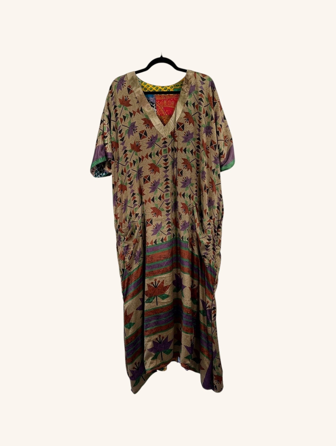 She Lives Beauty Luna Rosa reversible kaftan in vintage patchwork Rasgulla silk with floral and geometric patterns.