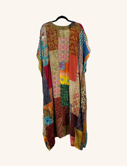 She Lives Beauty Luna Rosa reversible kaftan made from vintage patchwork Rasgulla silk in vibrant multi-colored prints.