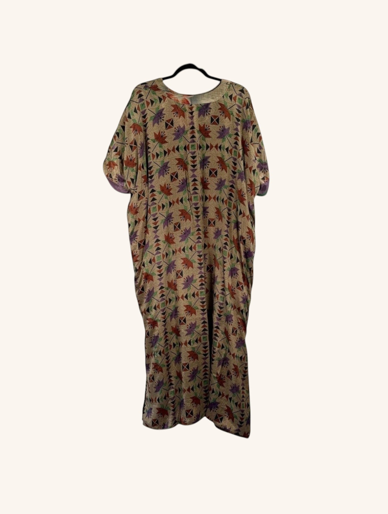She Lives Beauty Luna Rosa reversible kaftan made from vintage patchwork Rasgulla silk with a colorful geometric print.