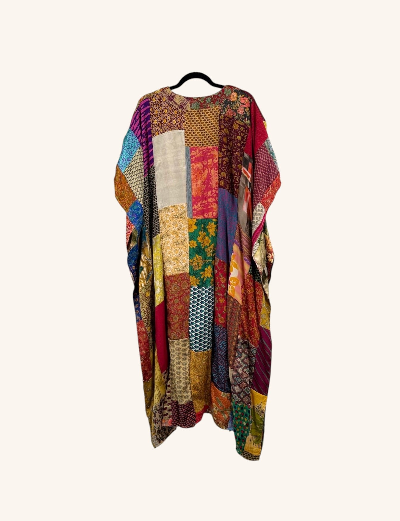 She Lives Beauty Luna Rosa reversible kaftan made from colorful vintage patchwork Rasgulla silk in a relaxed silhouette.