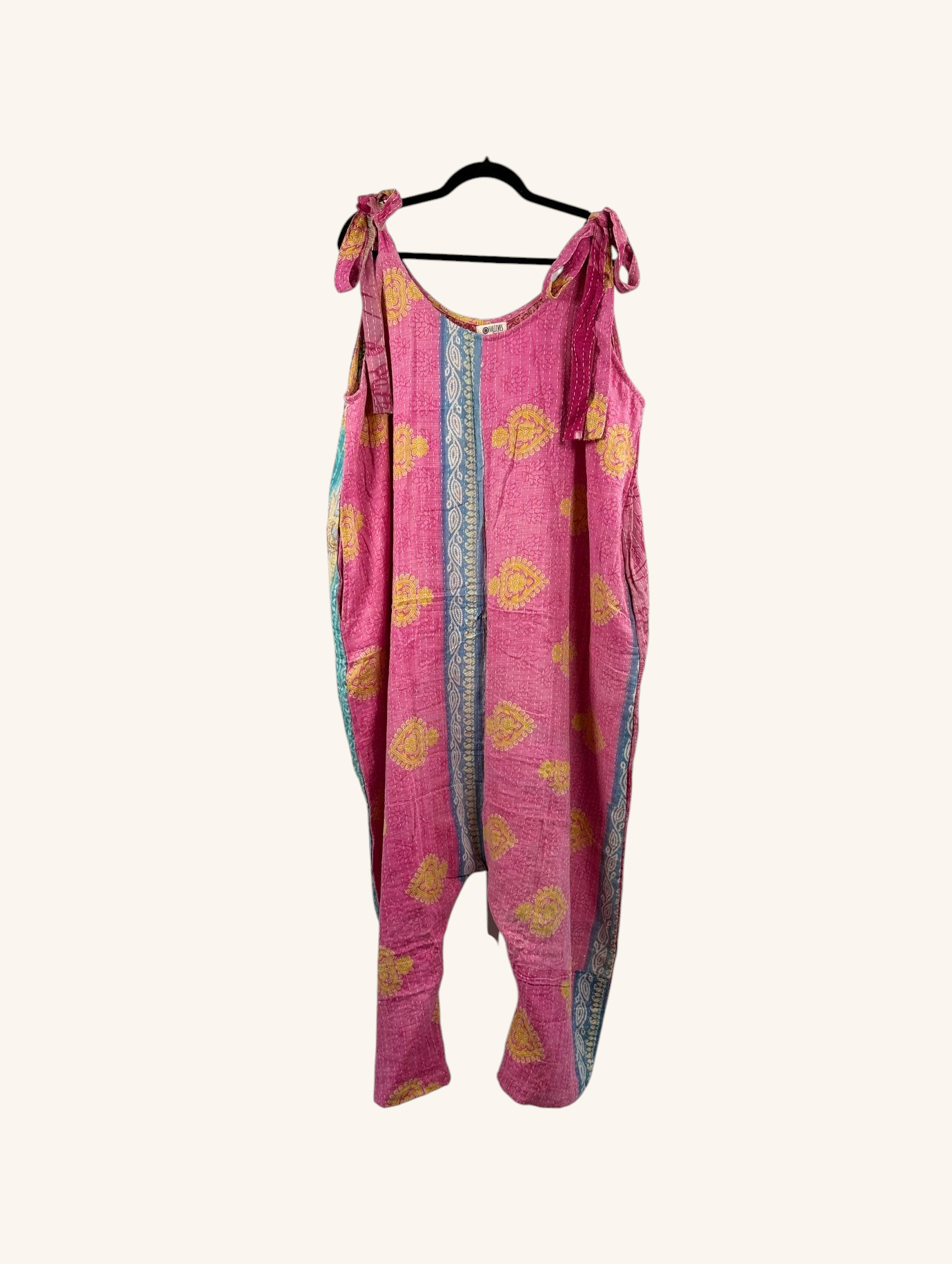 She Lives Beauty Becoming Wild harem jumpsuit in pink vintage kantha cotton with yellow floral patterns and tie straps