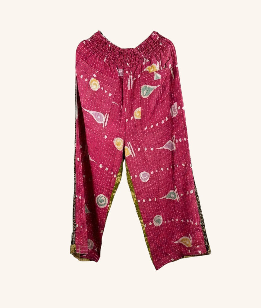 She Lives Beauty wide-leg pants in pink vintage kantha cotton with hand-stitched patterns and an elastic waistband.
