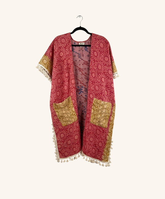 She Lives Beauty red and gold vintage cotton kantha kimono with short sleeves, front pockets, and artisan fringe trim.