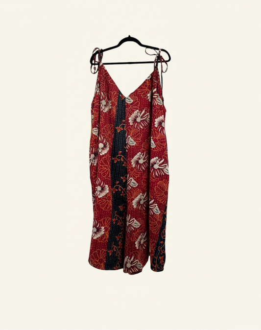 She Lives Beauty Sacred Journey Kantha jumpsuit in red vintage cotton with floral patterns and adjustable straps.