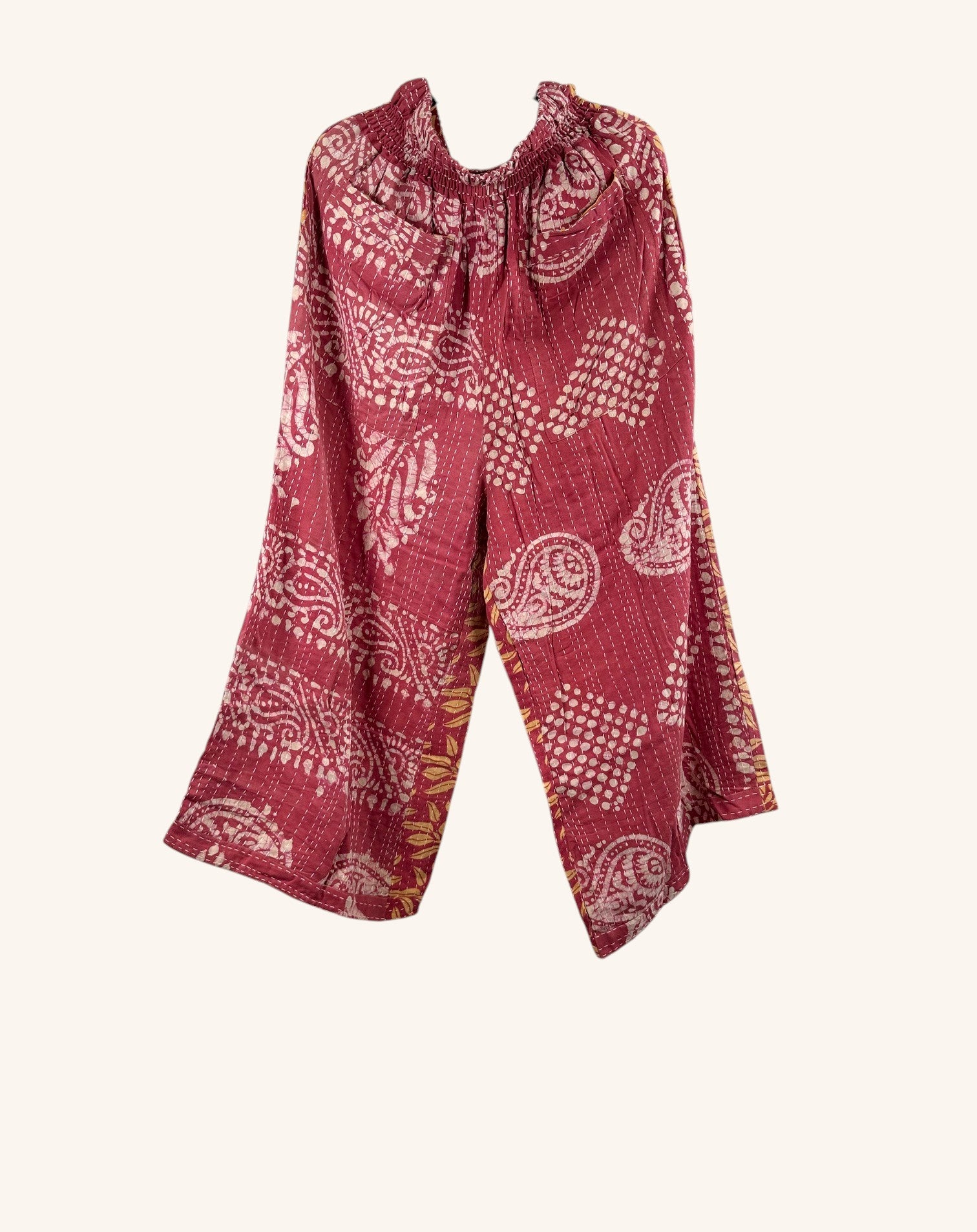 She Lives Beauty red vintage kantha cotton wide leg pants with white paisley and geometric patchwork patterns.
