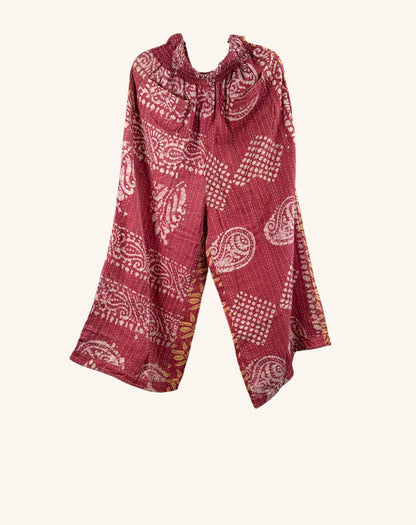 She Lives Beauty red vintage kantha cotton wide leg pants with white paisley and geometric patchwork patterns.
