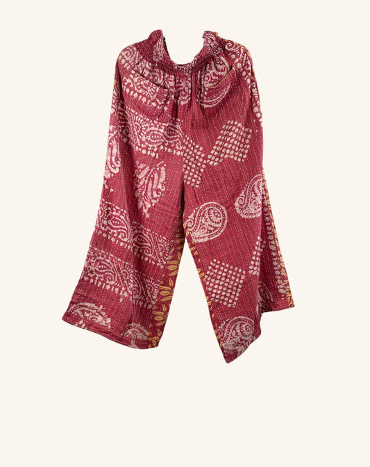 She Lives Beauty red vintage kantha cotton wide leg pants with white paisley and geometric patchwork patterns.