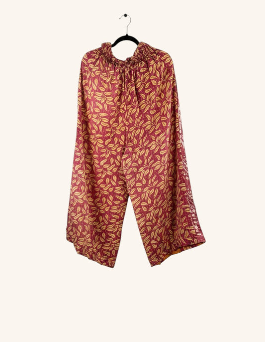 She Lives Beauty wide leg pants in red and gold vintage cotton with a leaf print and elastic waistband.