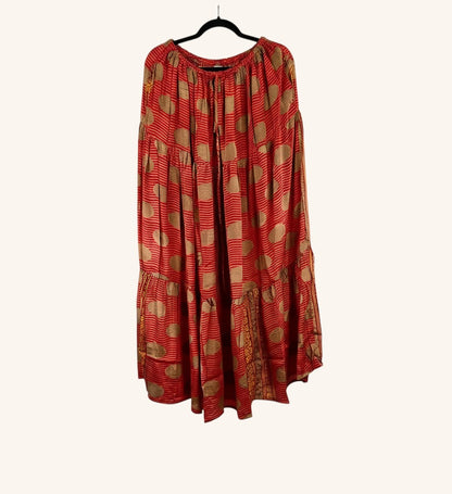 She Lives Beauty Prairie Soul maxi skirt in red and gold vintage rasgulla silk with kantha stitching and tiered design.