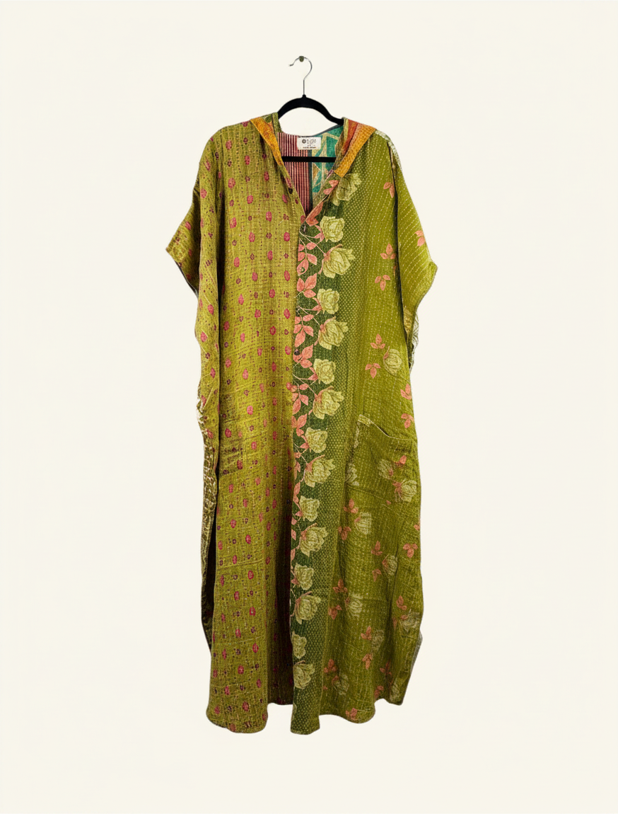 She Lives Beauty reversible green floral kantha cotton jumpsuit with a relaxed harem silhouette on a hanger
