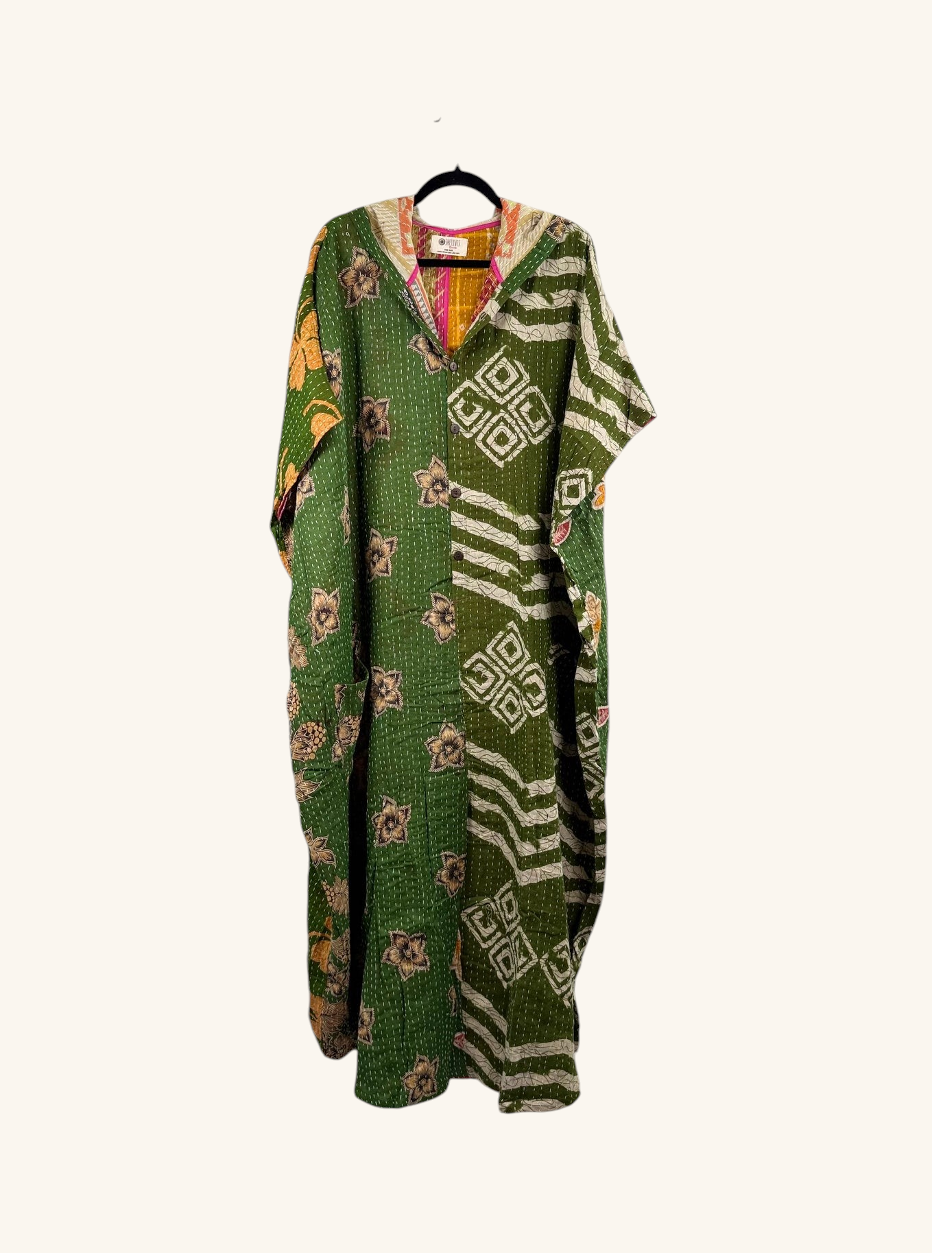 She Lives Beauty reversible green floral kantha cotton jumpsuit with a relaxed harem silhouette and button front.