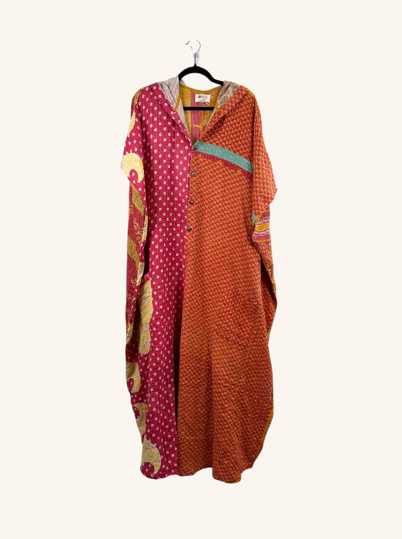 She Lives Beauty reversible dahlia jumpsuit in red and orange vintage kantha cotton with a relaxed harem silhouette.