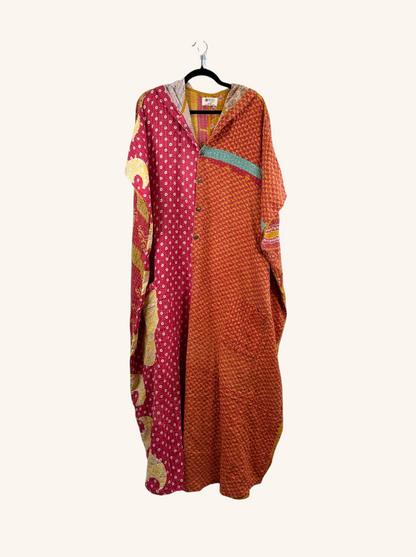 She Lives Beauty reversible dahlia jumpsuit in red and orange vintage kantha cotton with a relaxed harem silhouette.