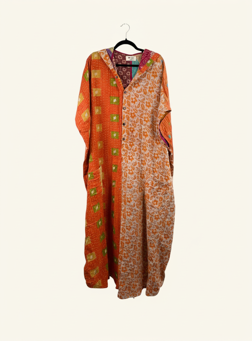 She Lives Beauty reversible dahlia jumpsuit made from vintage kantha cotton saris in orange and floral patterns.