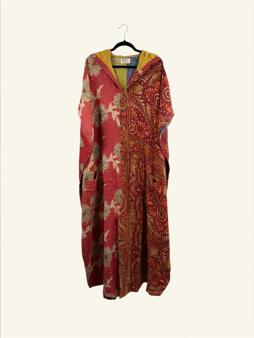 She Lives Beauty reversible dahlia jumpsuit made from vintage kantha cotton saris with a red floral pattern.