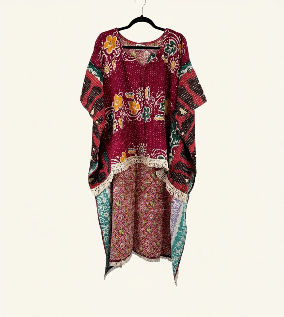 She Lives Beauty reversible hi-low Kantha top in burgundy vintage cotton with floral patterns and fringe trim.