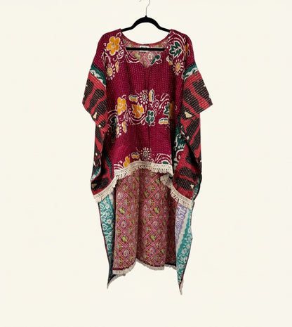 She Lives Beauty reversible hi-low Kantha top in burgundy vintage cotton with floral patterns and fringe trim.