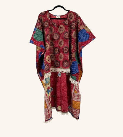 She Lives Beauty reversible hi-low Kantha top in red vintage cotton with colorful patterns and fringe trim.