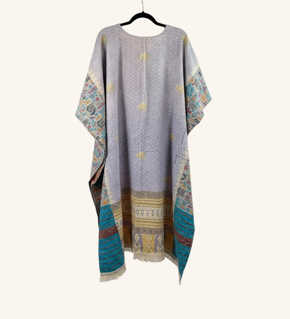 She Lives Beauty reversible Kantha top in lavender vintage cotton with bohemian patterns and fringe hem details.