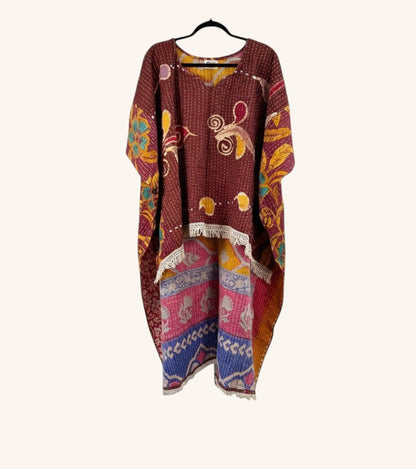 She Lives Beauty reversible Kantha top in burgundy cotton with bohemian floral patterns and fringe hem hi-low design.