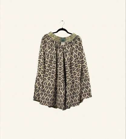 She Lives Beauty Earth Song reversible capri pants in beige and black leaf print vintage silk cotton on a hanger