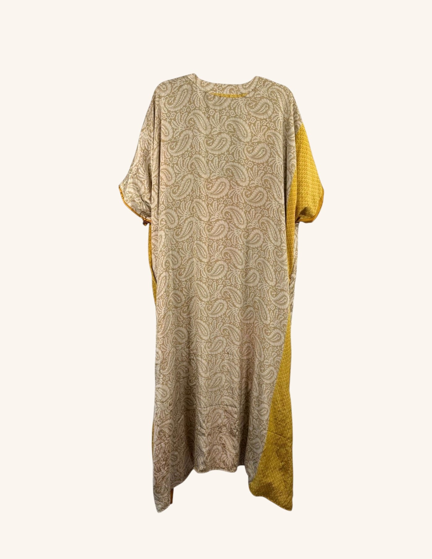 She Lives Beauty Luna Rosa reversible kaftan in beige and yellow vintage patchwork silk with paisley patterns.